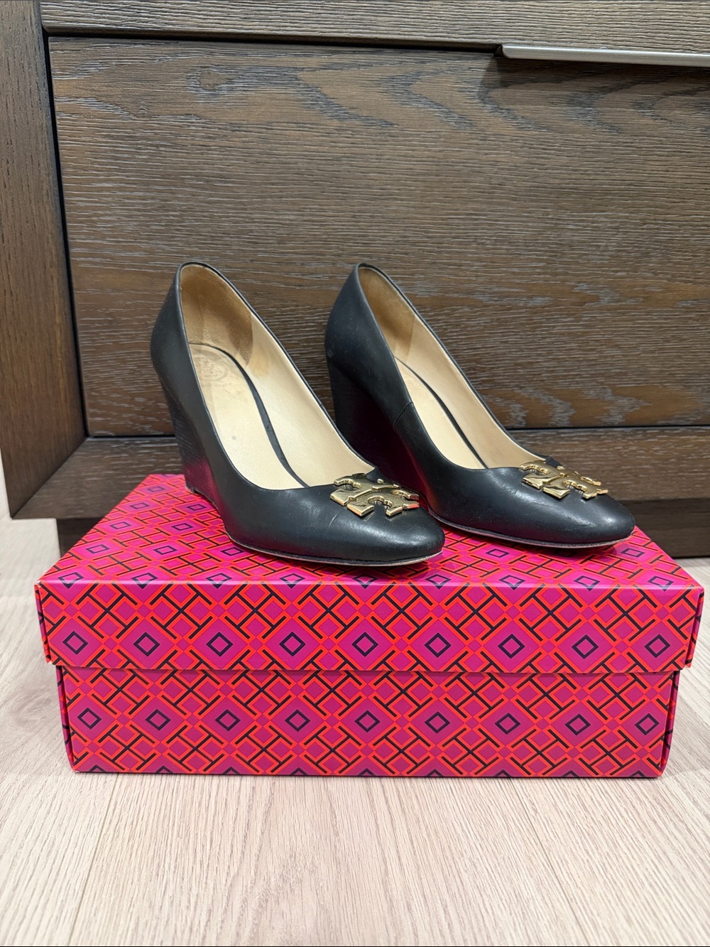 Tory Burch Women's Black Leather Wedge Pumps with Gold Logo Accent
